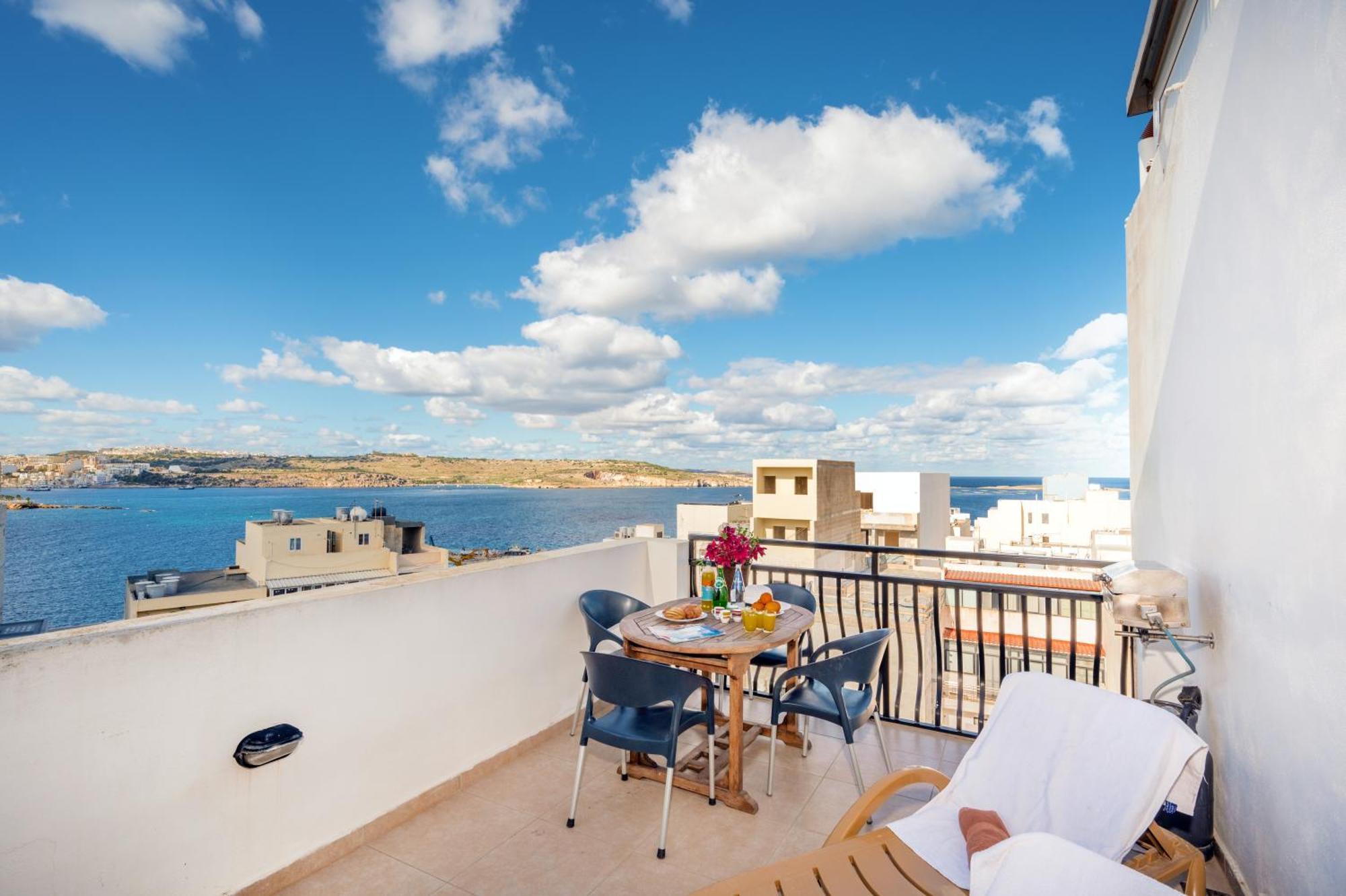 Seashells 2 Bedroom With Sunny Terrace With Stunning Sea Views - By Getawaysmalta